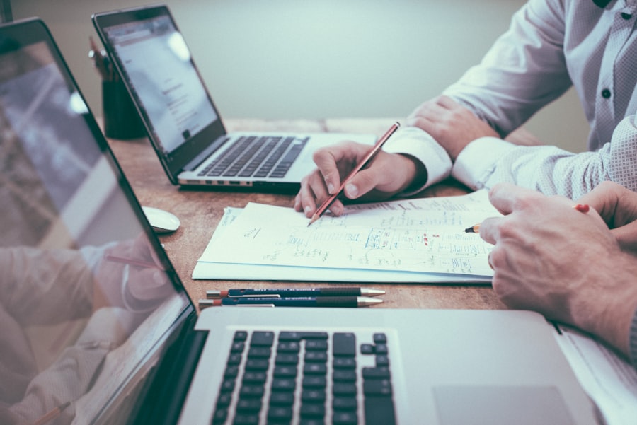 Business owners reviewing finances and recovery plans