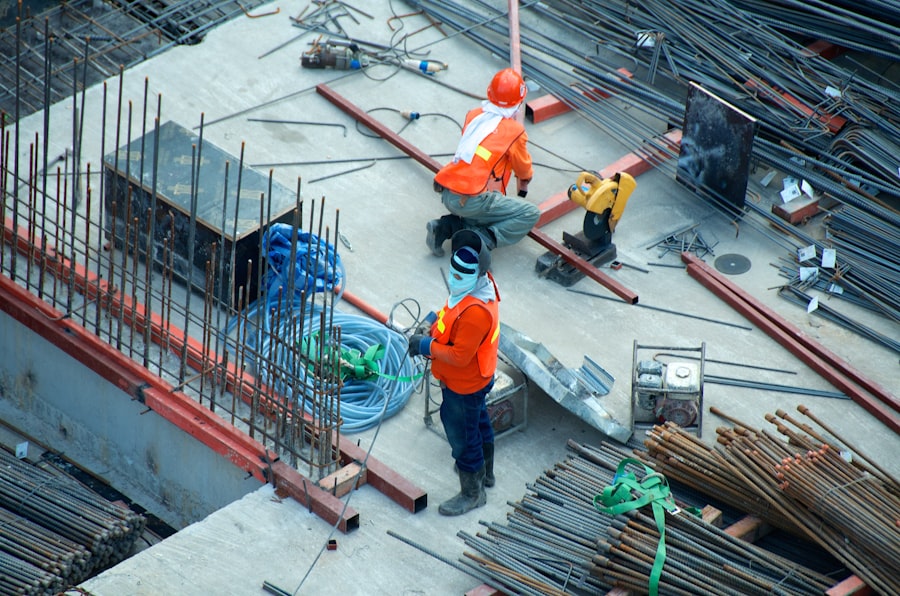 Construction workers in safety gear on a job site